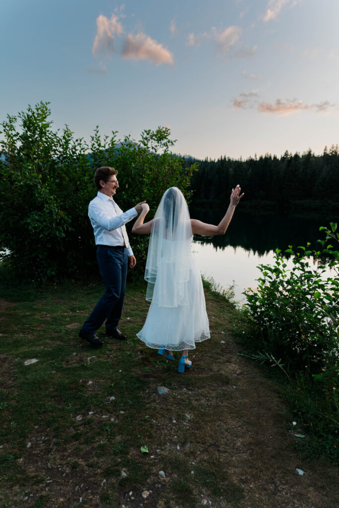 A couple dancing at golden hour at gold creek pond 