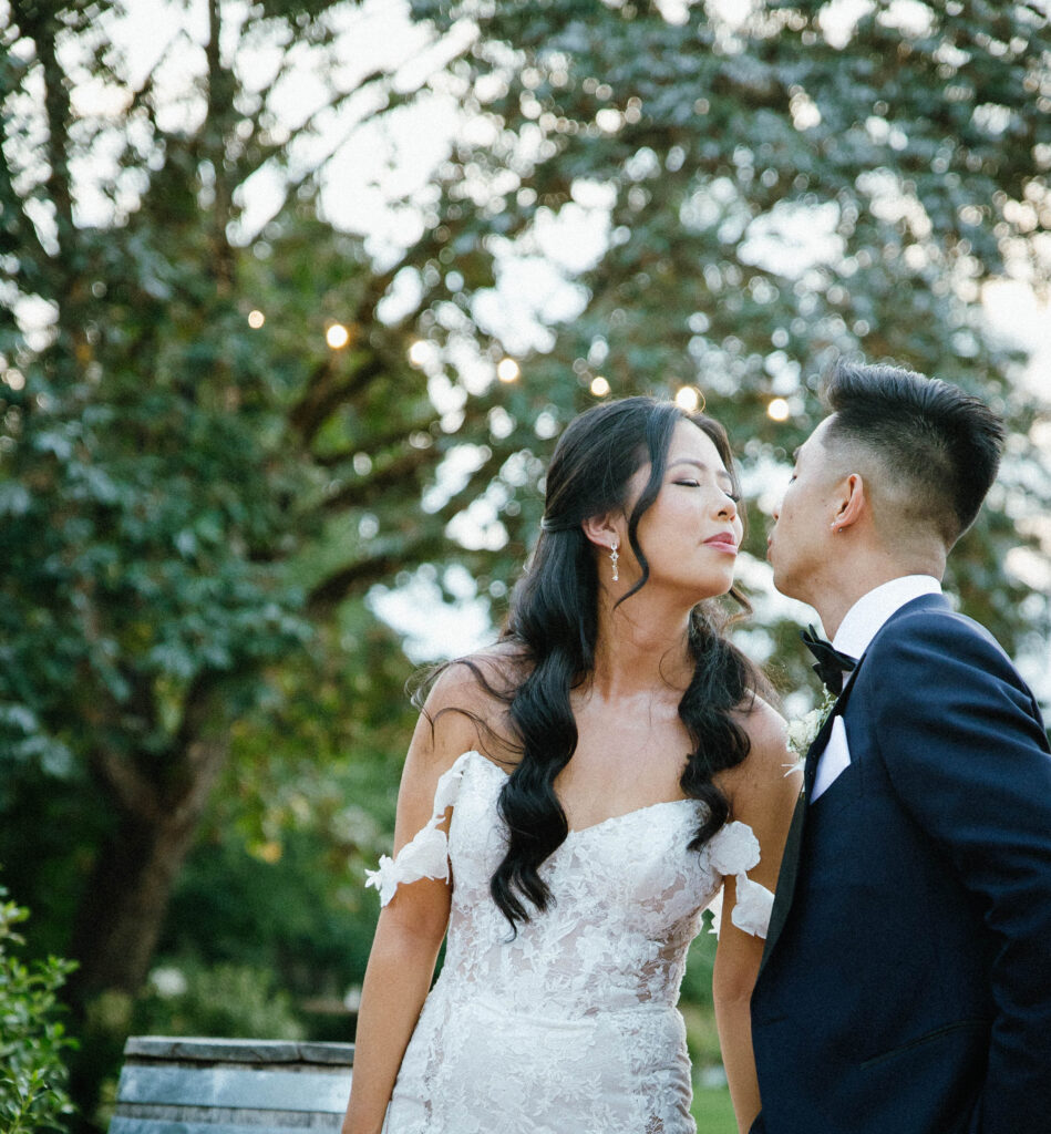 couple kissing during golden hour
